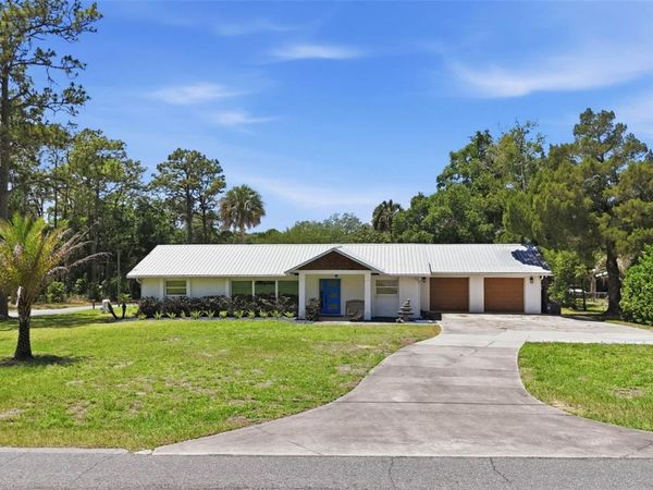 37237 GRAYS AIRPORT ROAD, LADY LAKE, FL 32159