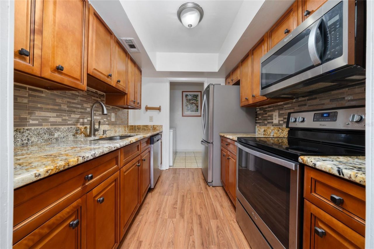 5973 Windhover Drive , Unit E06, Orlando, FL 32819 Photo