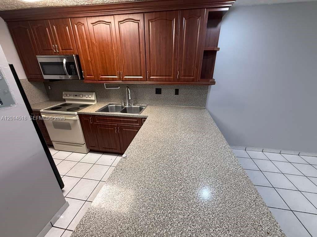 6055 W 19th Ave, Unit 215, Hialeah, FL 33012 Photo