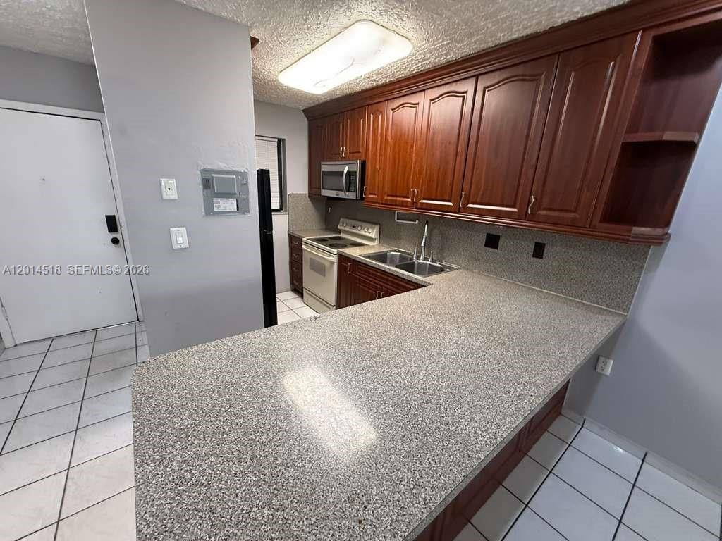 6055 W 19th Ave, Unit 215, Hialeah, FL 33012 Photo