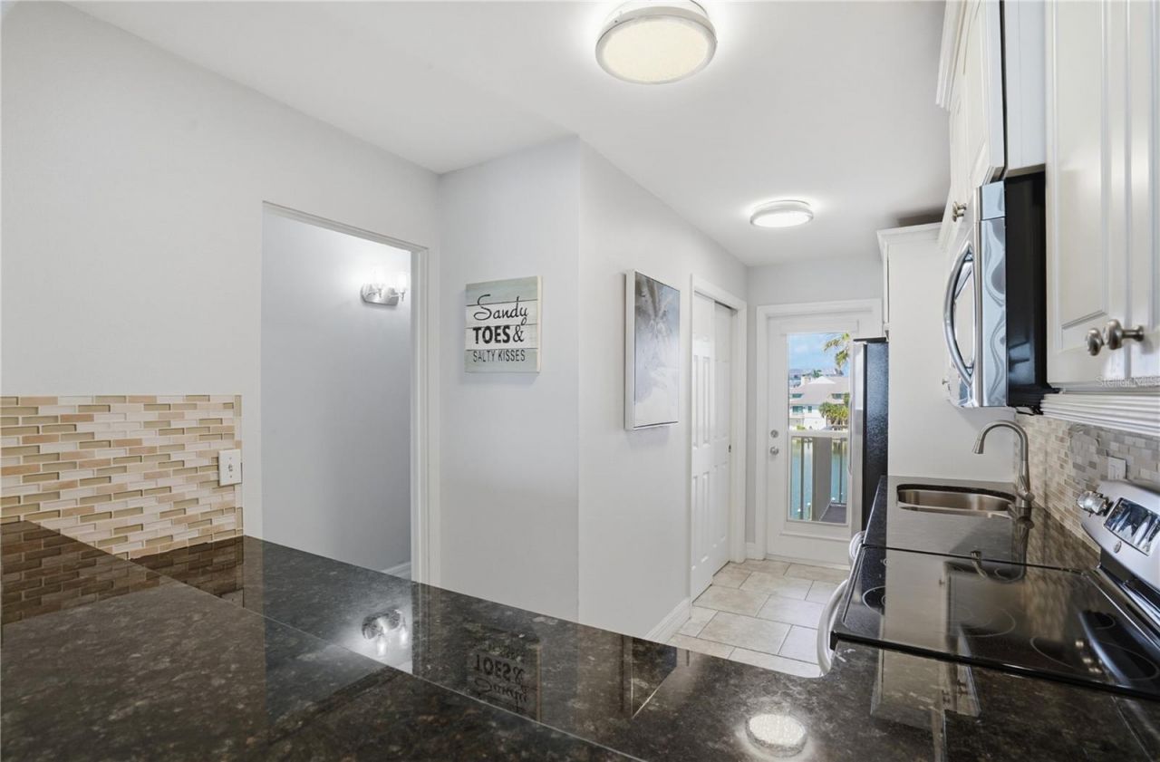 8900 Blind Pass Road, Unit A306, Sarasota, FL 34242 Photo