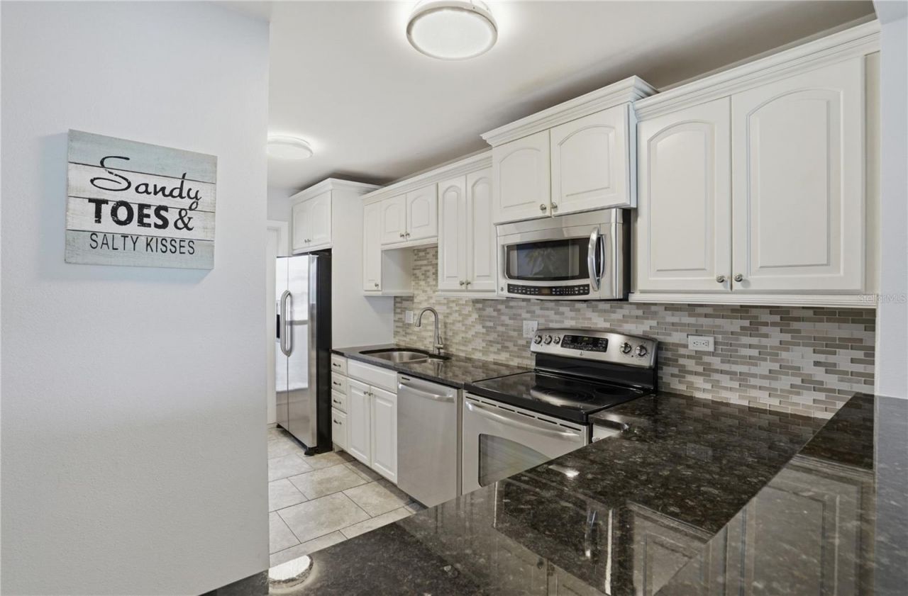 8900 Blind Pass Road, Unit A306, Sarasota, FL 34242 Photo