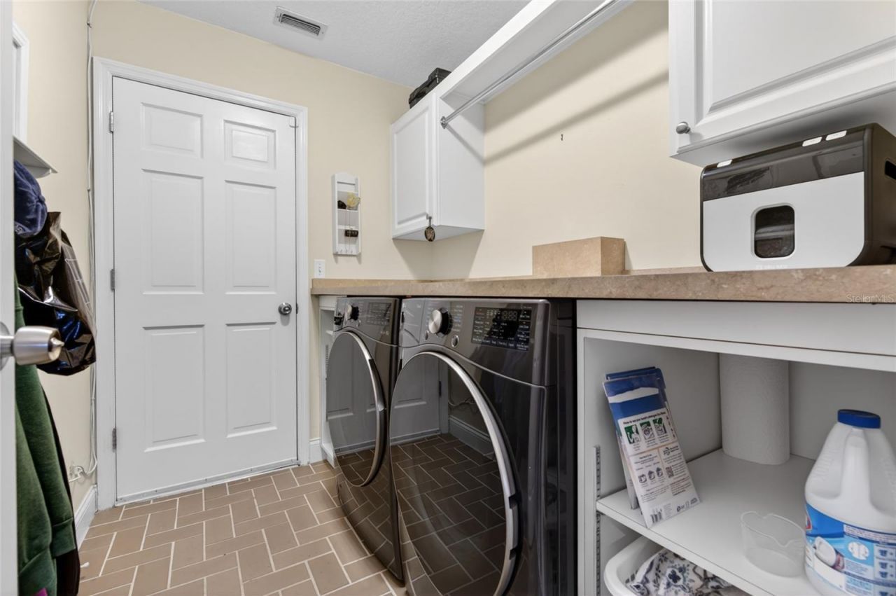 8243 Riviera Shore Court , Orlando, FL 32817 Photo