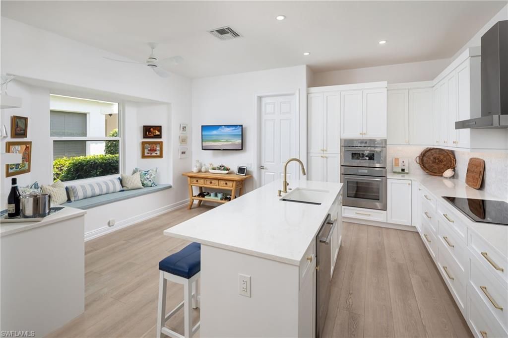 9239 Troon Lakes Dr, Naples, FL 34109 Photo
