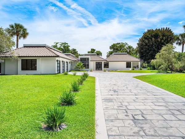1648 Breakers West Boulevard, West Palm Beach, FL 33411
