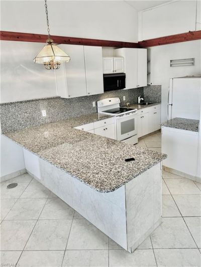 826 Wiggins Pass Rd, Unit 302, Naples, FL 34110 Photo