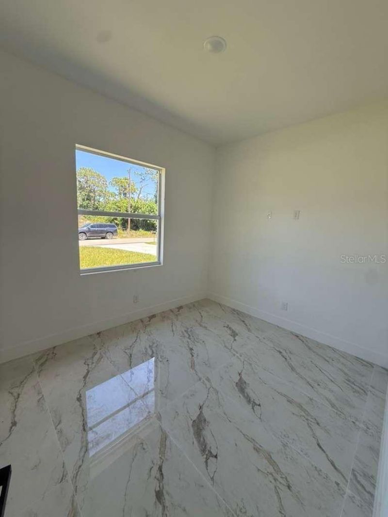 908 Winters Street E, Lehigh Acres, FL 33974 Photo