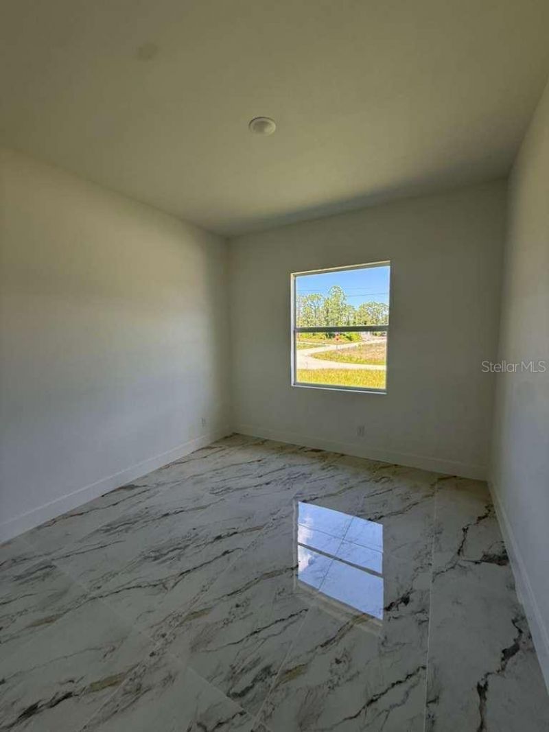 908 Winters Street E, Lehigh Acres, FL 33974 Photo