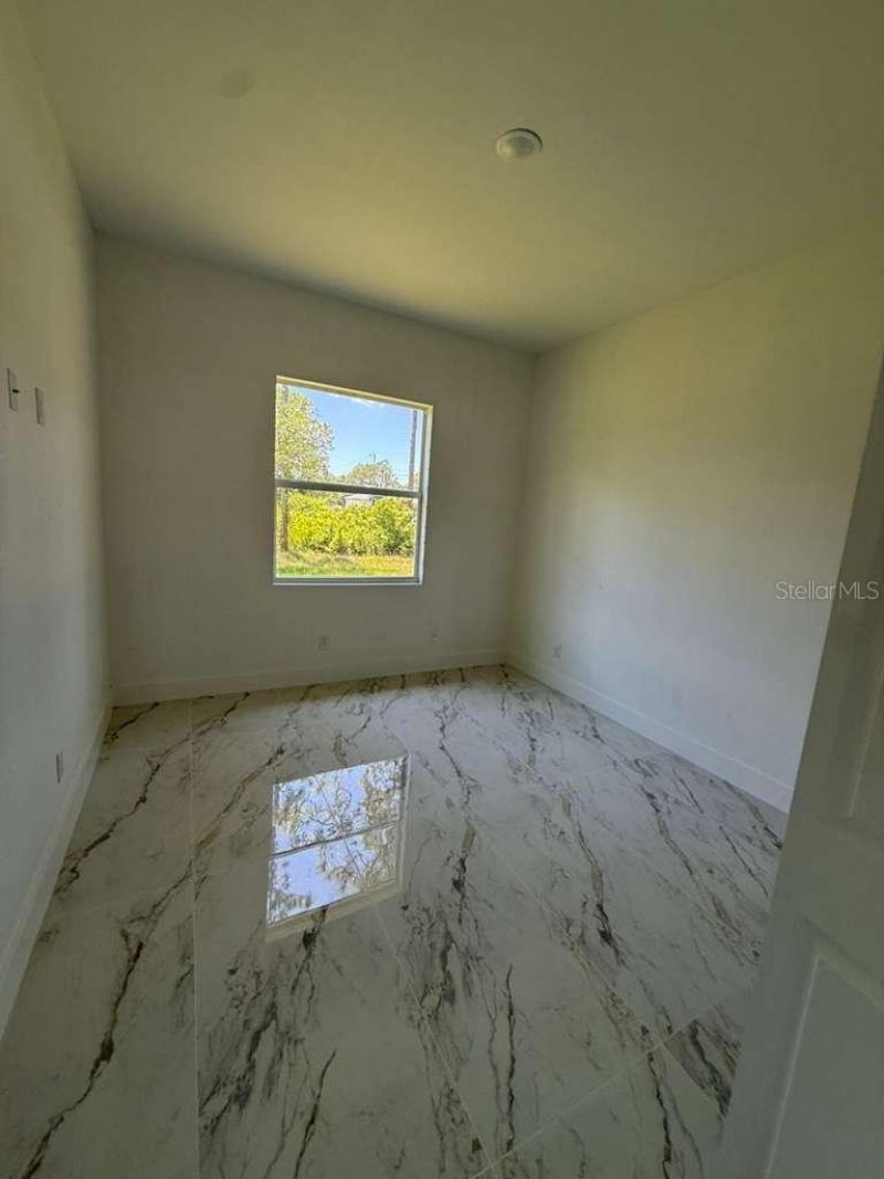 908 Winters Street E, Lehigh Acres, FL 33974 Photo