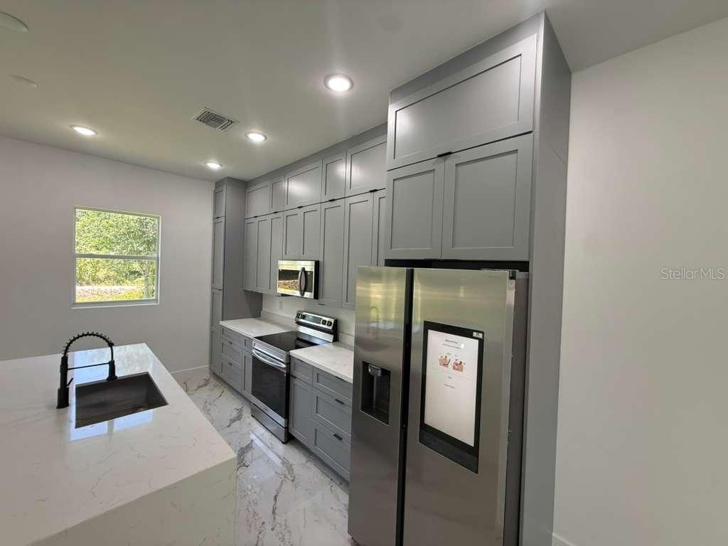 908 Winters Street E, Lehigh Acres, FL 33974 Photo