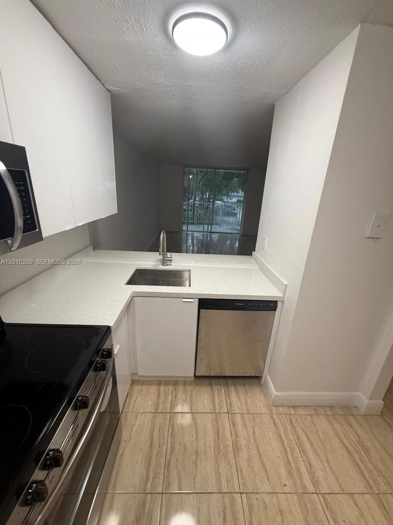 496 NW 165th St Rd , Unit D-210, Miami, FL 33169 Photo