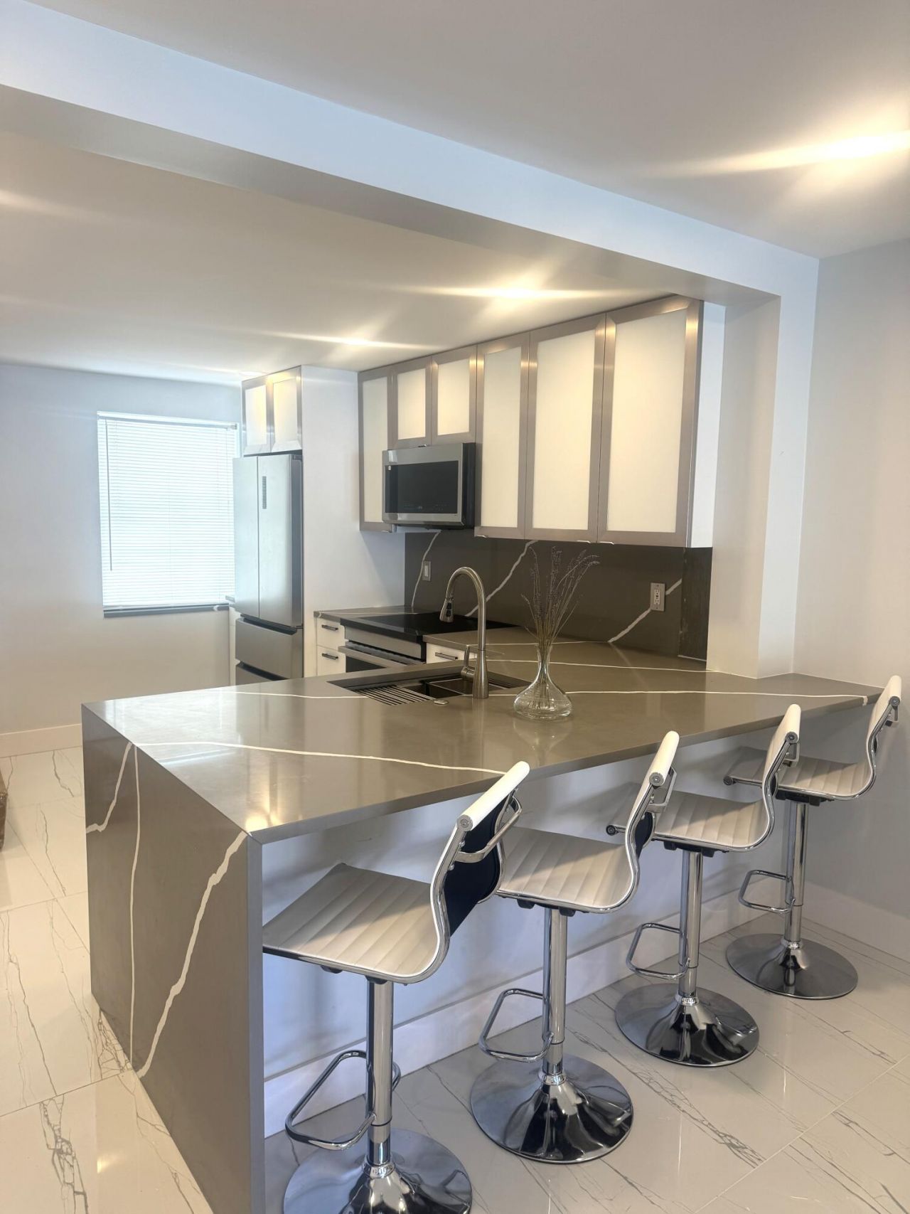 105 Paradise Harbour Boulevard, Unit 108, North Palm Beach, FL 33408 Photo