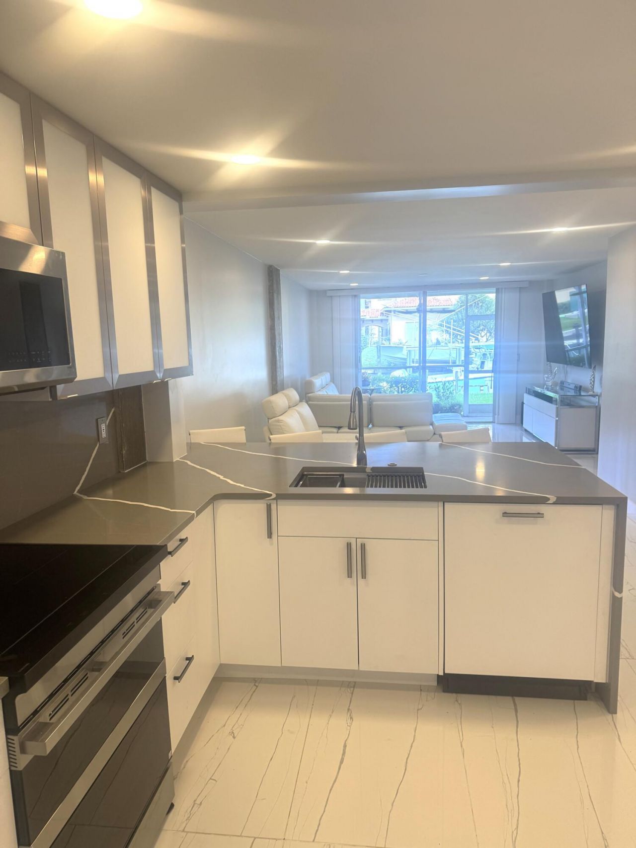 105 Paradise Harbour Boulevard, Unit 108, North Palm Beach, FL 33408 Photo