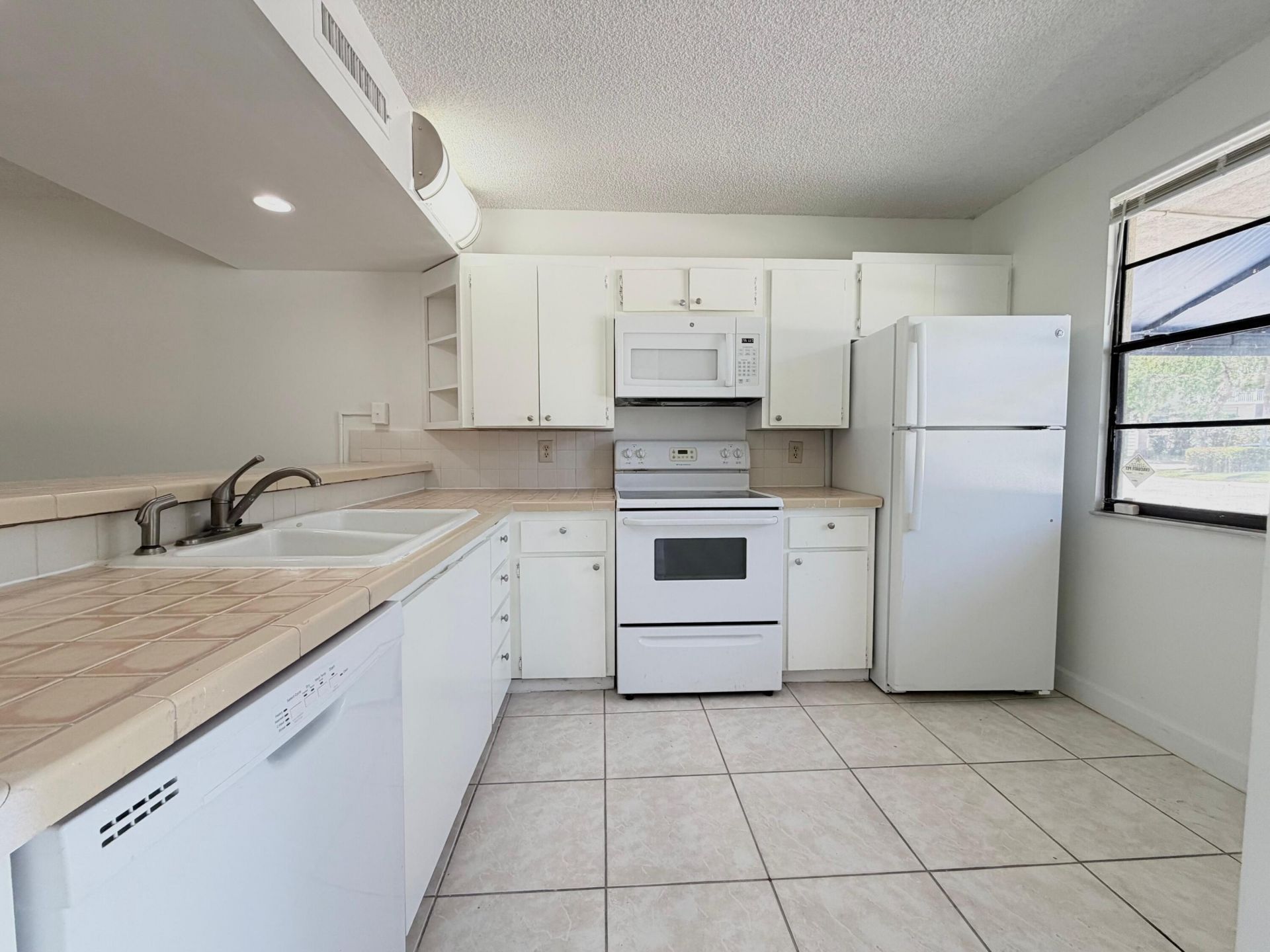 3511 Village Boulevard, Unit 103, West Palm Beach, FL 33409 Photo