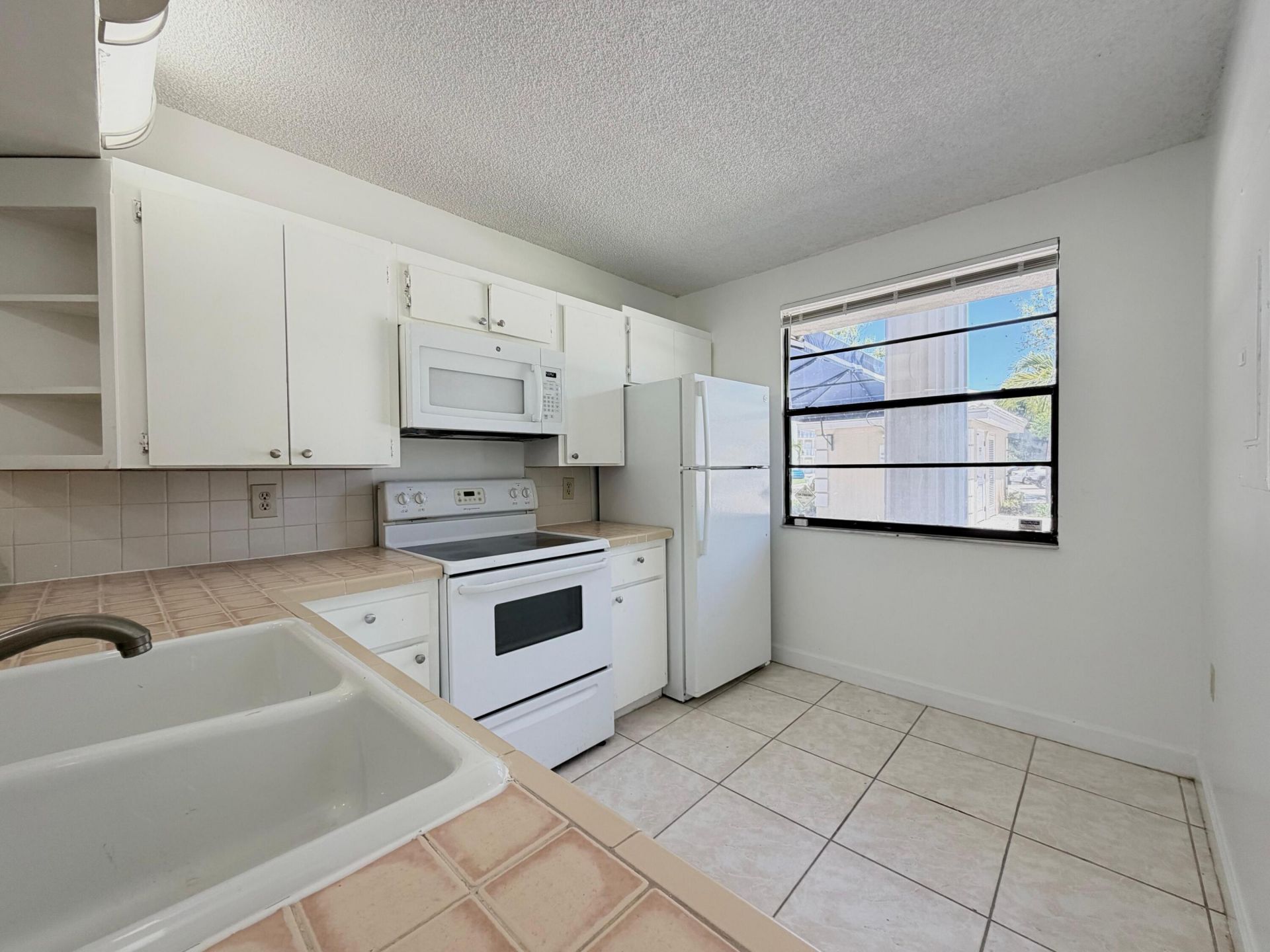 3511 Village Boulevard, Unit 103, West Palm Beach, FL 33409 Photo