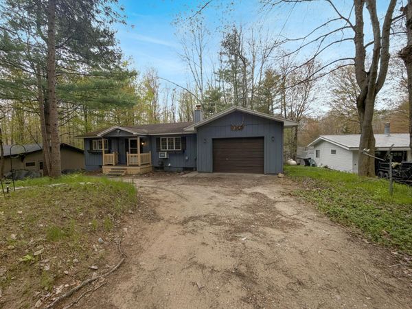 8281 Pine Tree Trail, Canadian Lakes, MI 49346