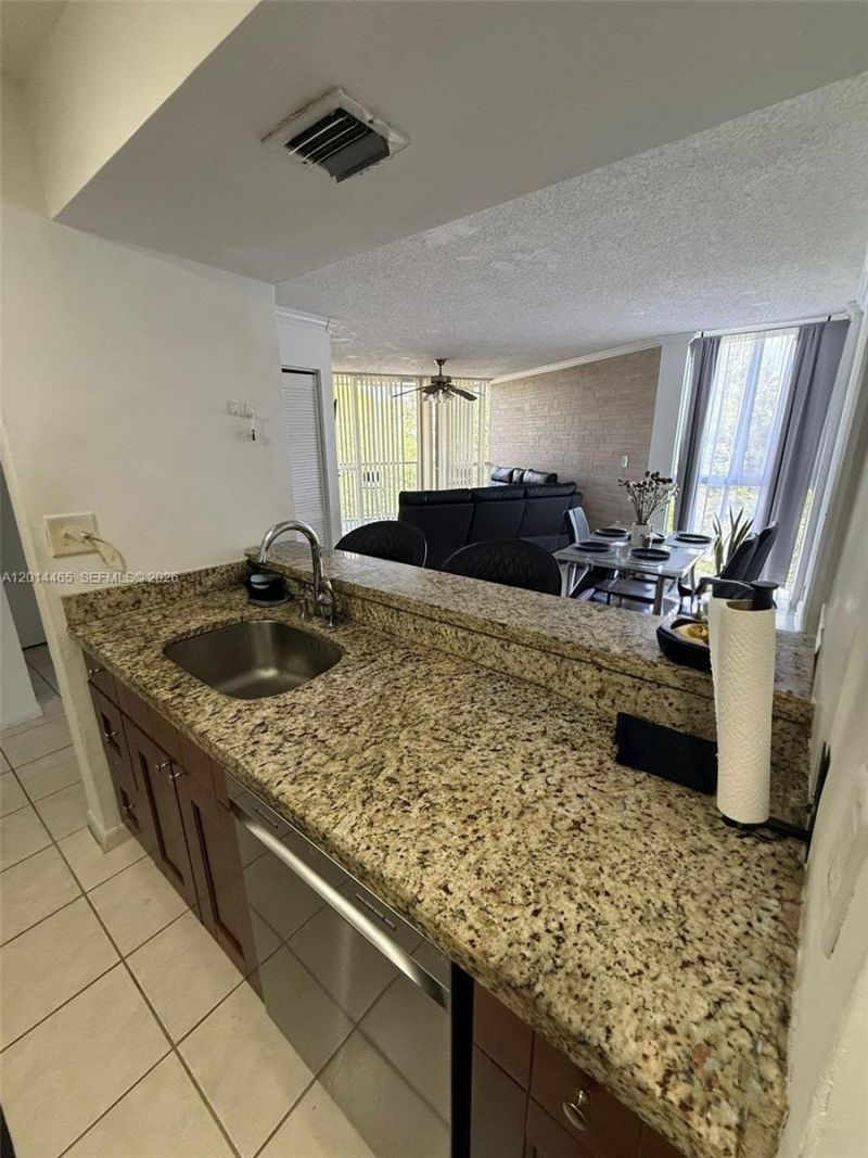 6955 NW 186th St , Unit F402, Hialeah, FL 33015 Photo