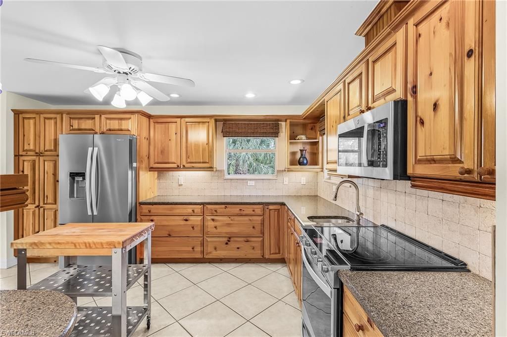 14221 Clubhouse Dr, Bokeelia, FL 33922 Photo