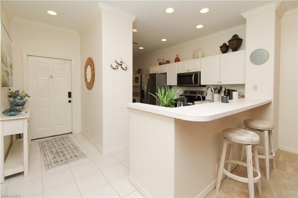 8217 Parkstone Pl, Unit 102, Naples, FL 34120 Photo