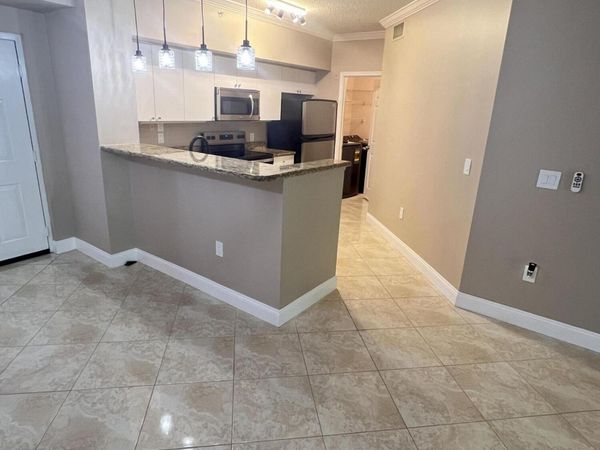 11780 St Andrews Place, Unit 105, Wellington, FL 33414
