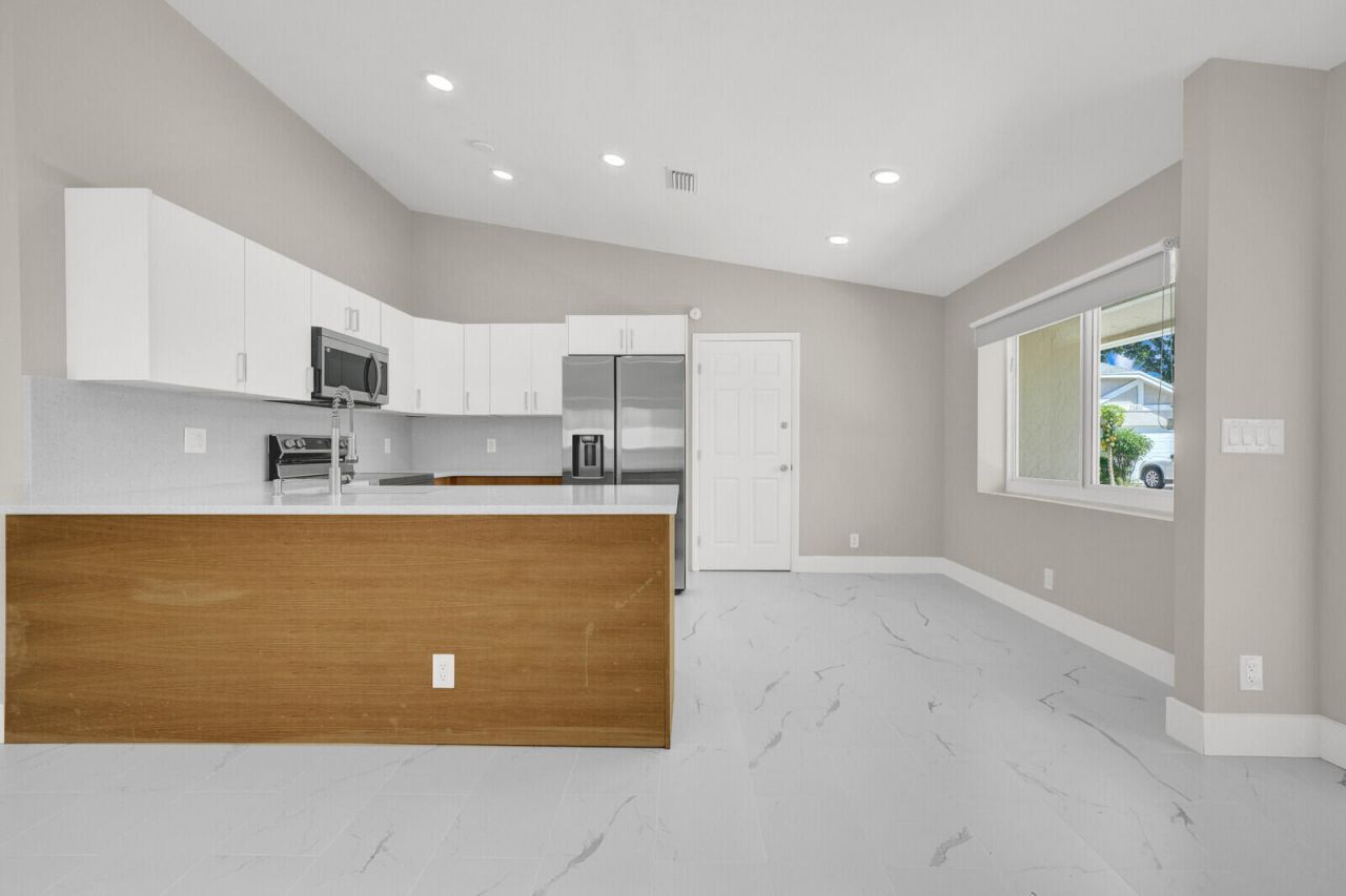 23392 E Country Club Dr Drive E, Watergate, FL 33428 Photo