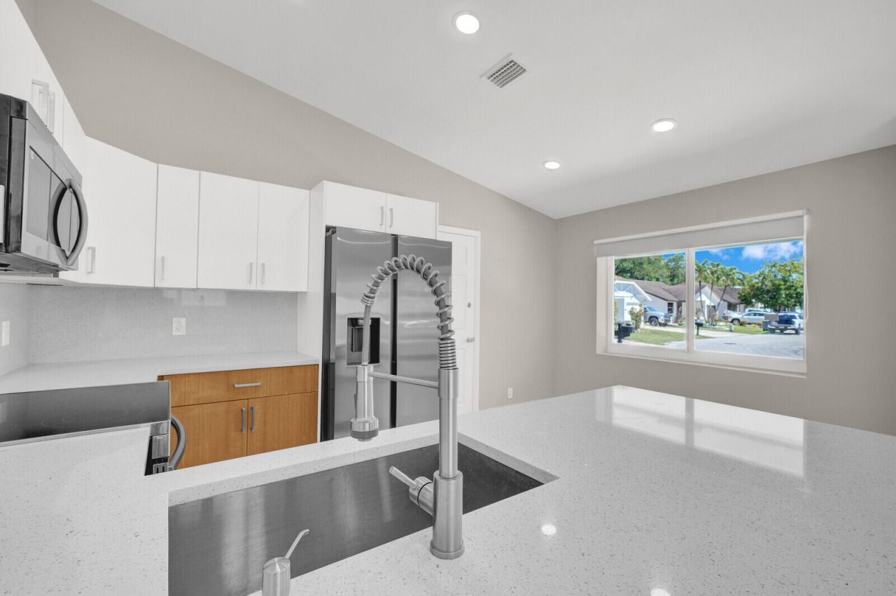 23392 E Country Club Dr Drive E, Watergate, FL 33428 Photo