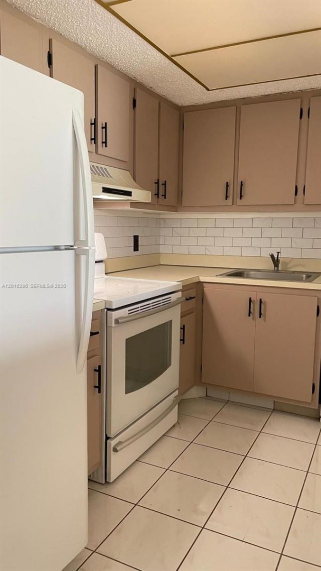 5550 NW 44th St , Unit 407B, Lauderhill, FL 33319 Photo