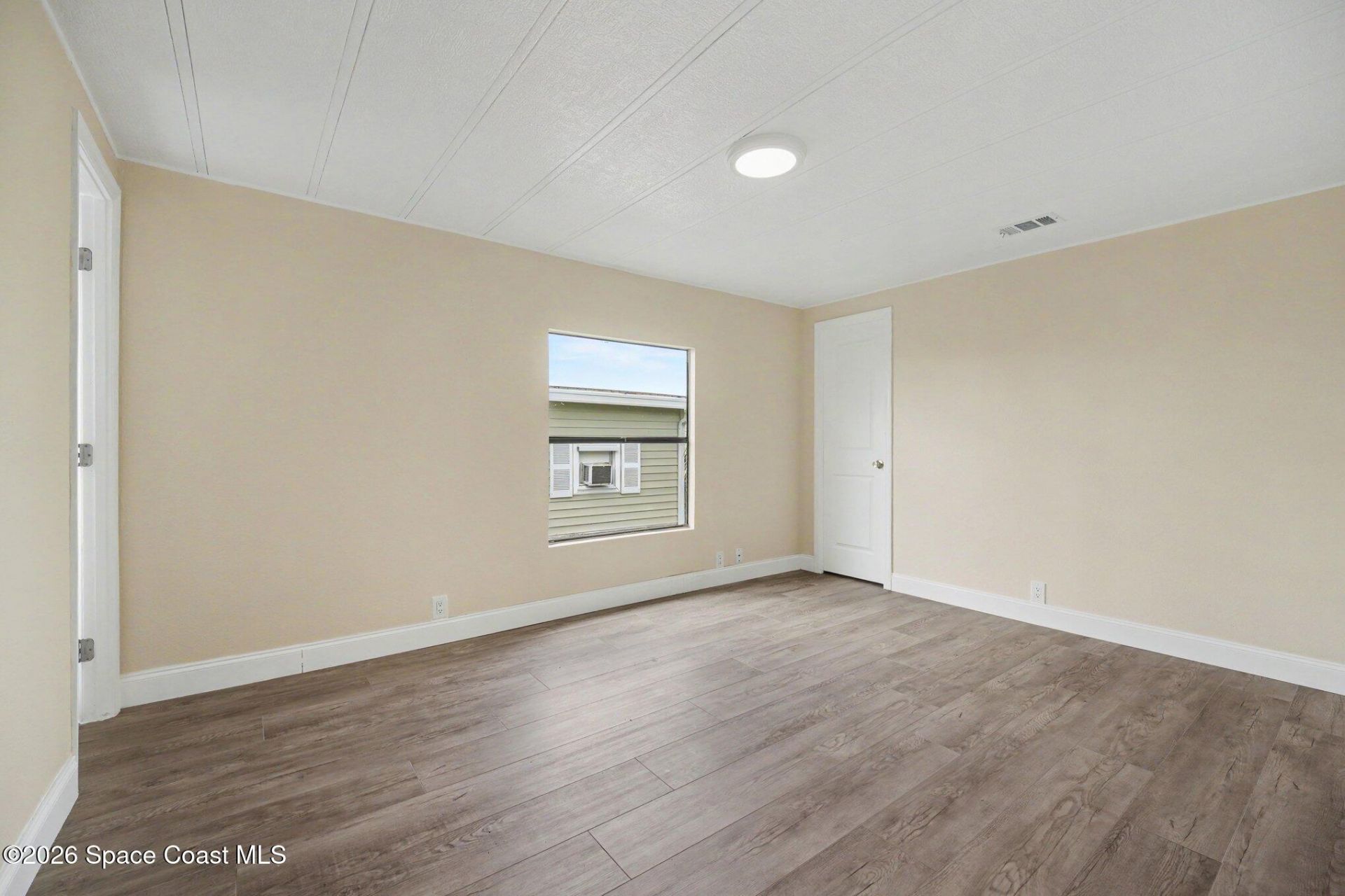 911 Hyacinth Circle, Barefoot Bay, FL 32976 Photo