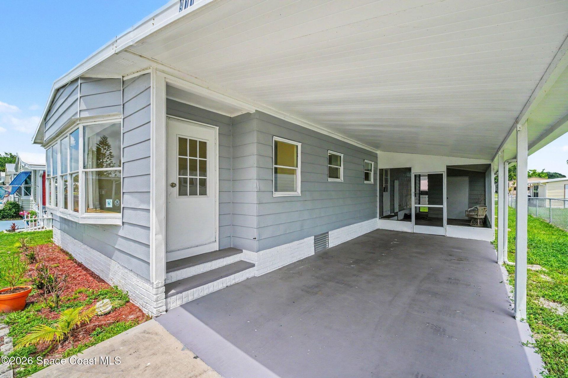 911 Hyacinth Circle, Barefoot Bay, FL 32976 Photo