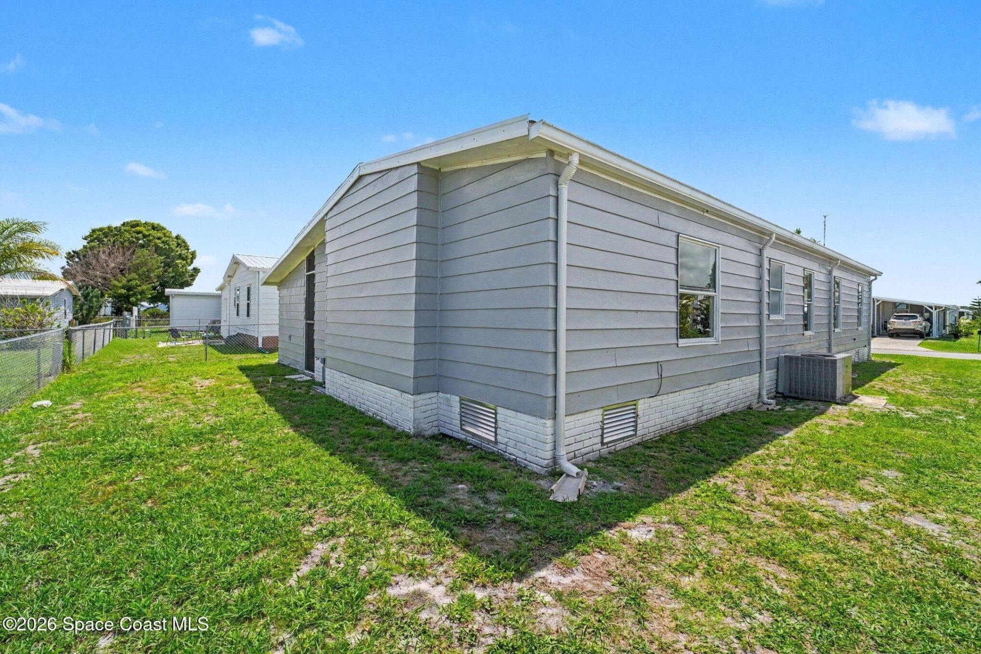 911 Hyacinth Circle, Barefoot Bay, FL 32976 Photo