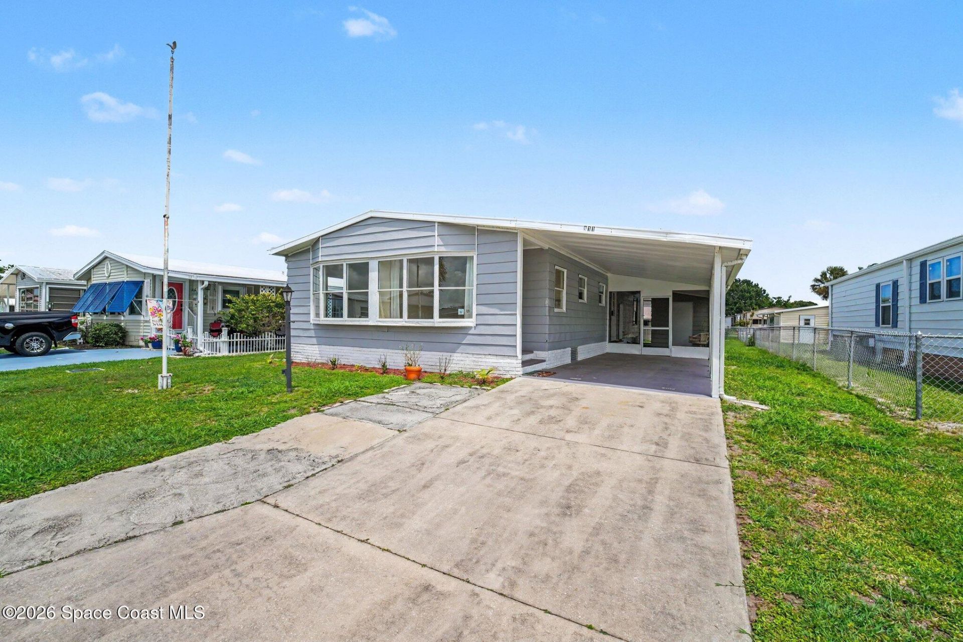 911 Hyacinth Circle, Barefoot Bay, FL 32976 Photo