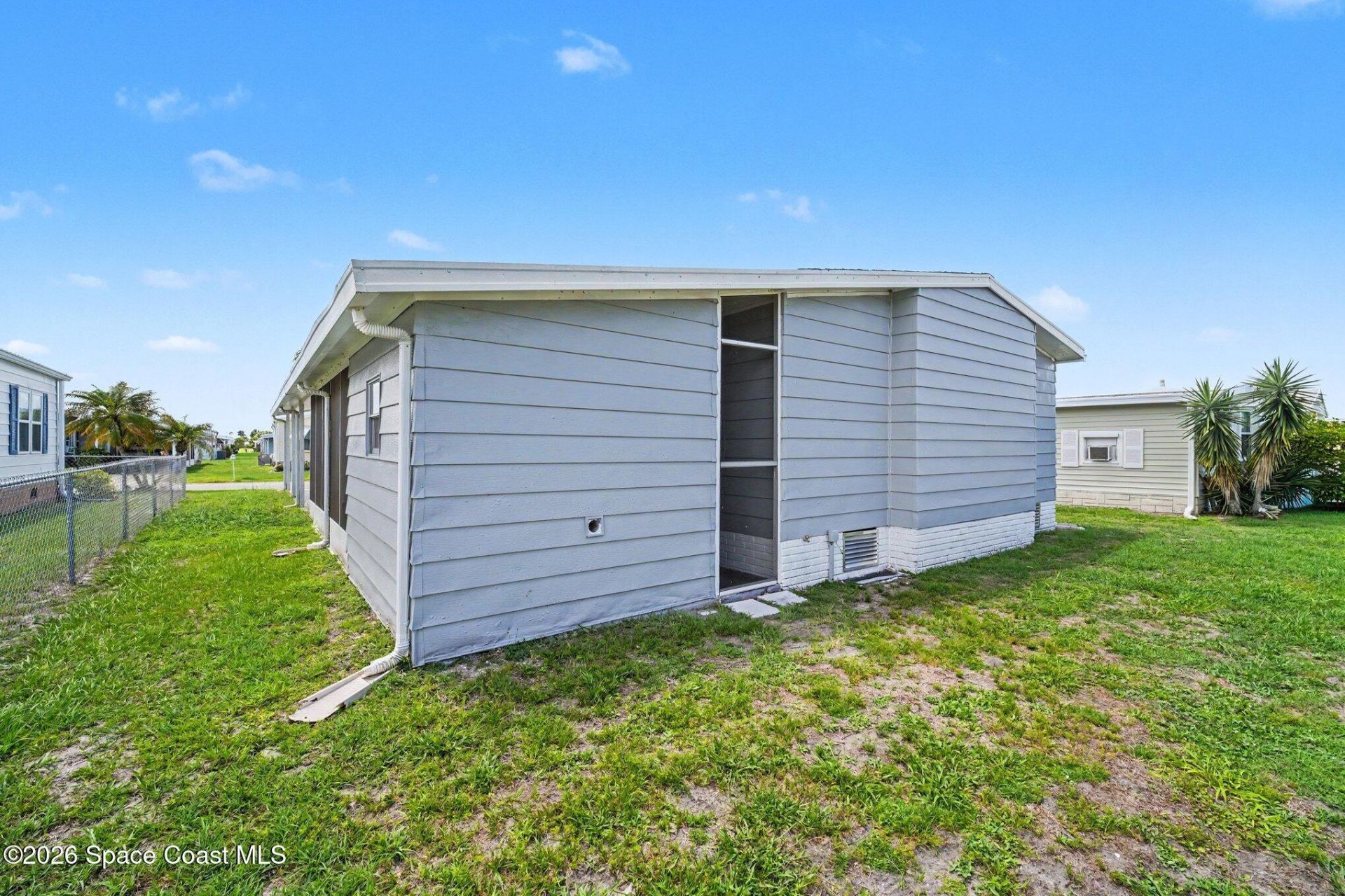 911 Hyacinth Circle, Barefoot Bay, FL 32976 Photo