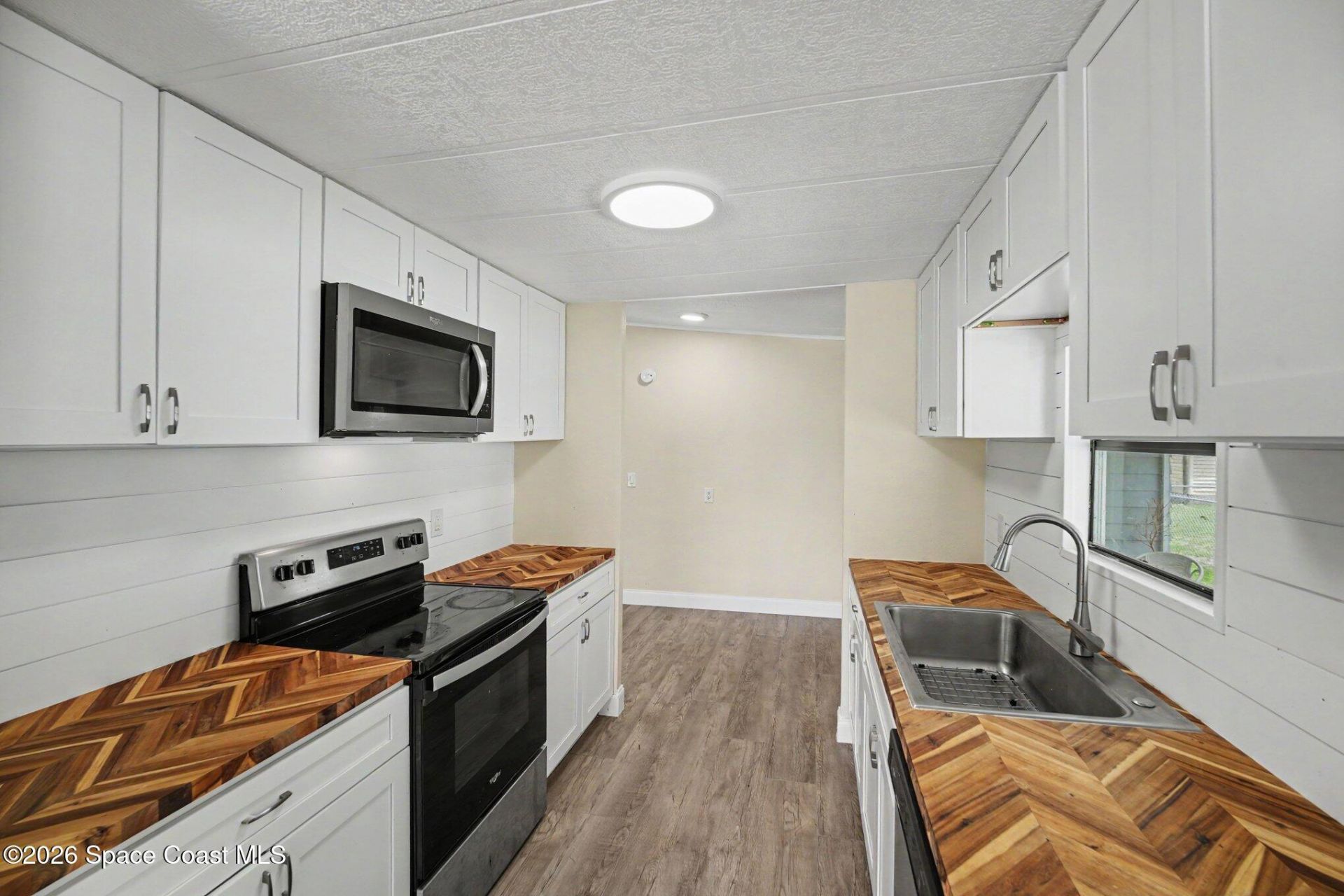 911 Hyacinth Circle, Barefoot Bay, FL 32976 Photo