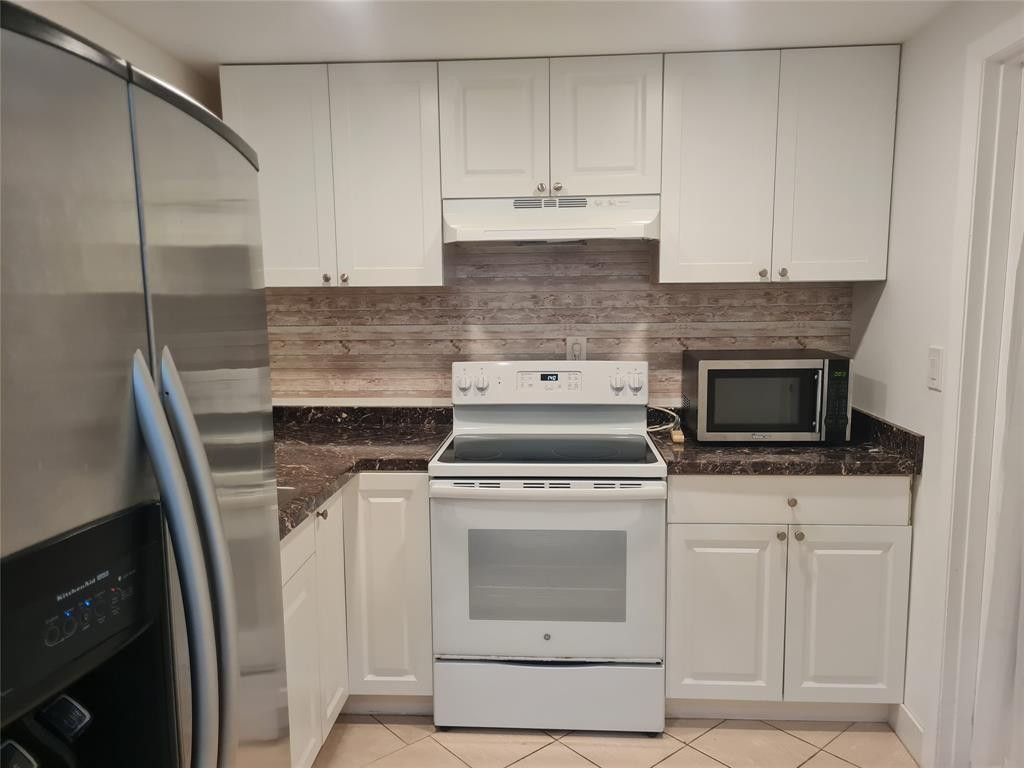 300 Golden Isles Drive, Unit 104, Hallandale Beach, FL 33009 Photo