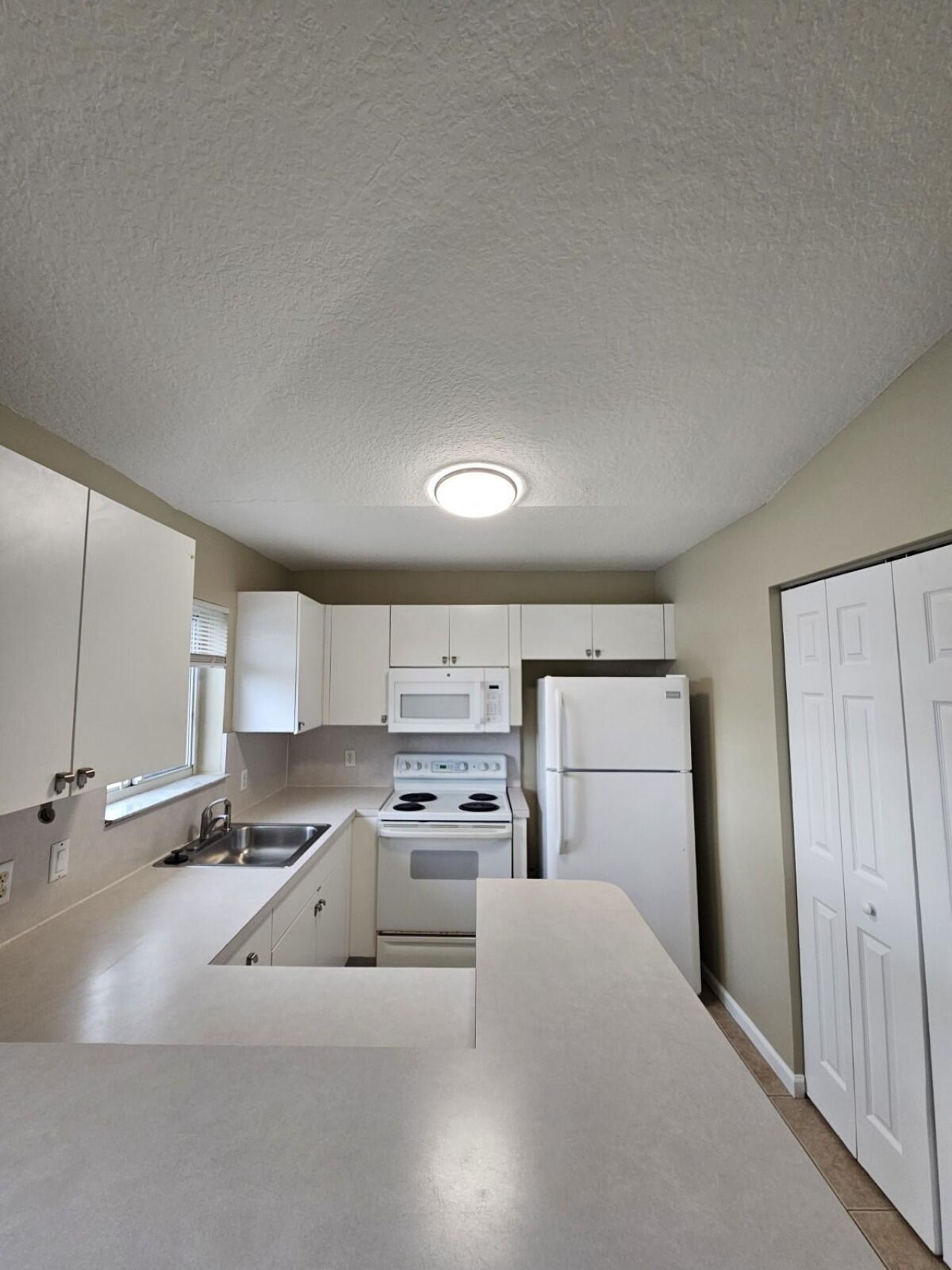 3490 Briar Bay Boulevard, Unit 206, West Palm Beach, FL 33411 Photo