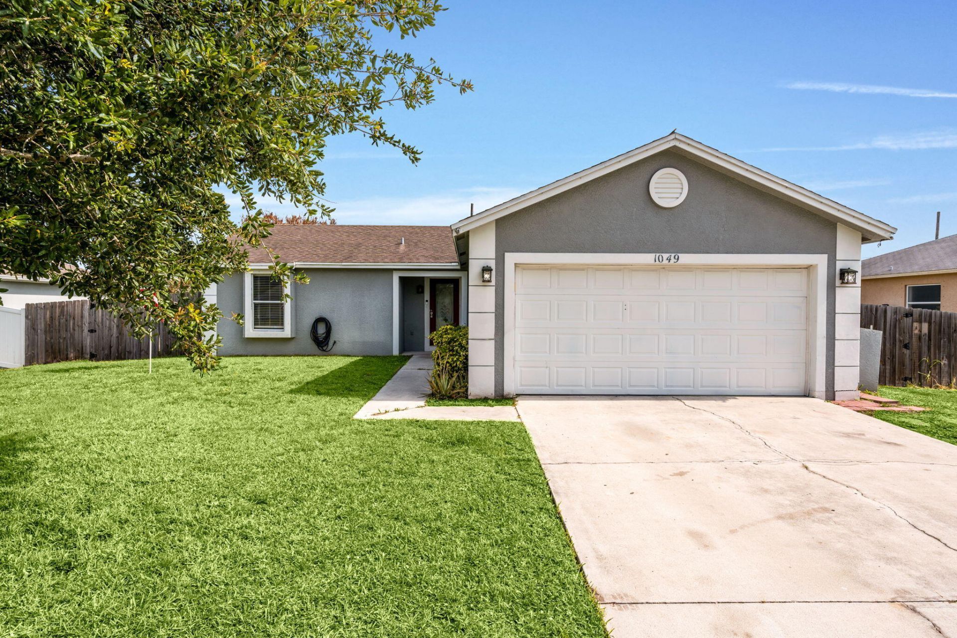 1049 SW Mccracken Avenue, Port Saint Lucie, FL 34953 Photo