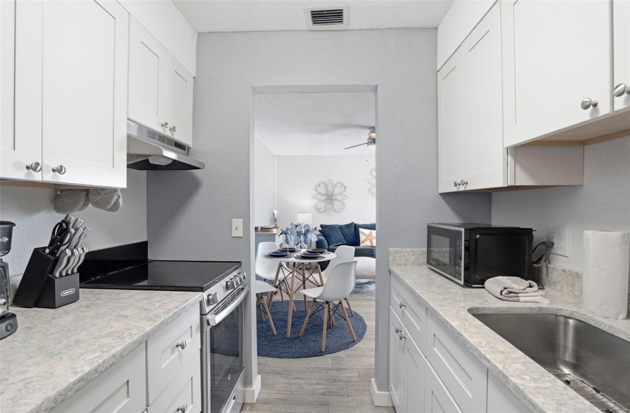 155 Medallion Boulevard , Unit E, Madeira Beach, FL 33708 Photo