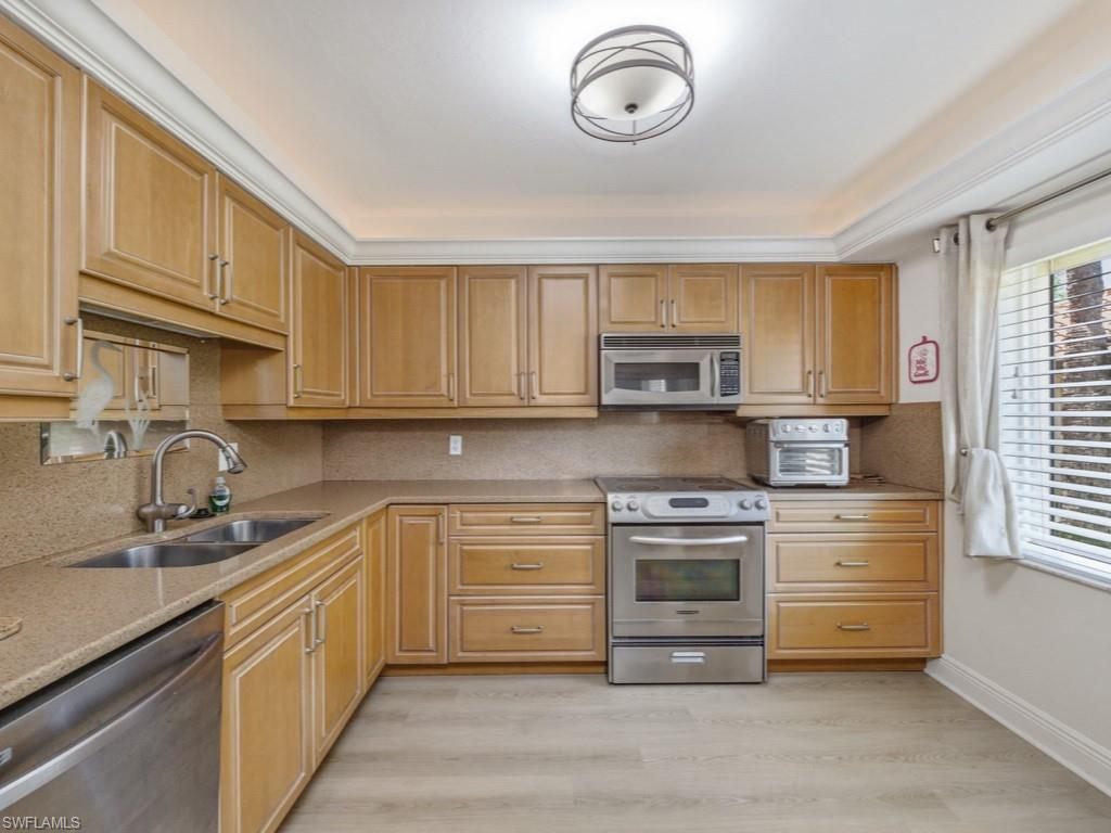 3207 Horse Carriage Way, Unit 403, Naples, FL 34105 Photo