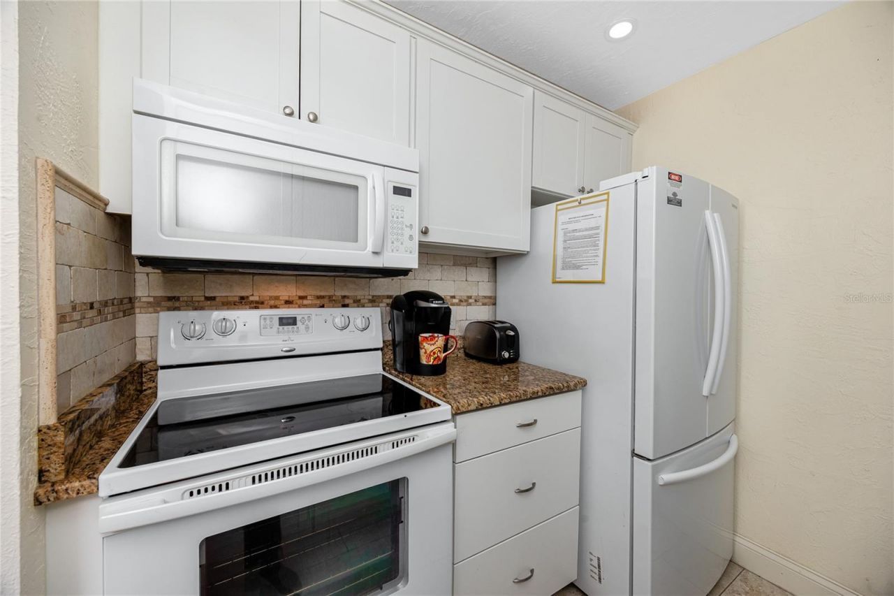159 Medallion Boulevard , Unit F, Madeira Beach, FL 33708 Photo