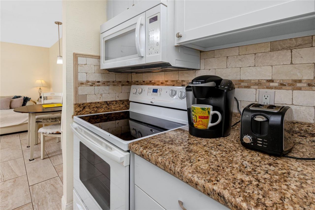 159 Medallion Boulevard , Unit F, Madeira Beach, FL 33708 Photo