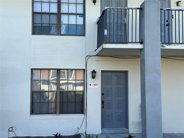 6077 VILLAGE CIRCLE , Unit 6077, ORLANDO, FL 32822