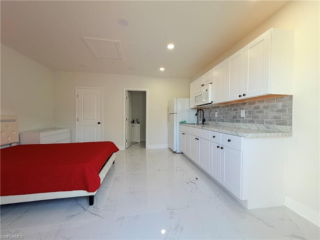 100 NW 13th Pl, Cape Coral, FL 33993 Photo
