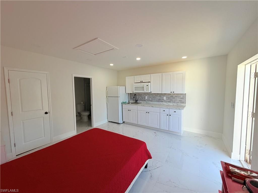 100 NW 13th Pl, Cape Coral, FL 33993 Photo