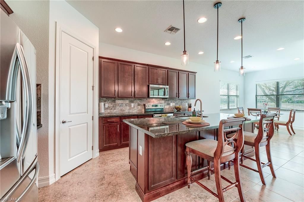 9209 Woodhurst Dr , Naples, FL 34120 Photo