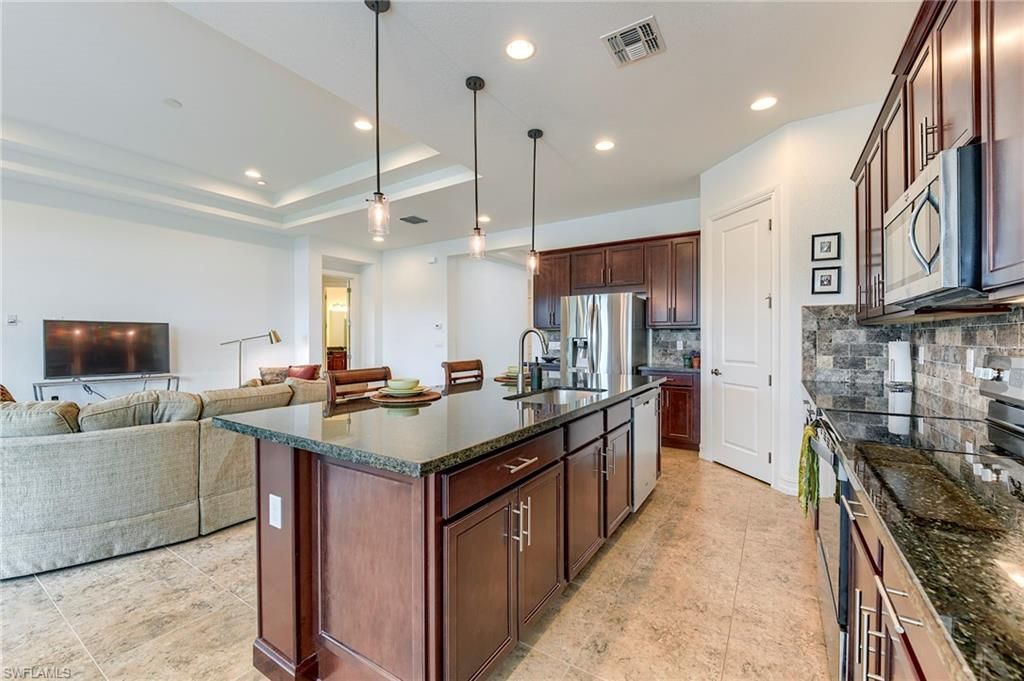 9209 Woodhurst Dr , Naples, FL 34120 Photo