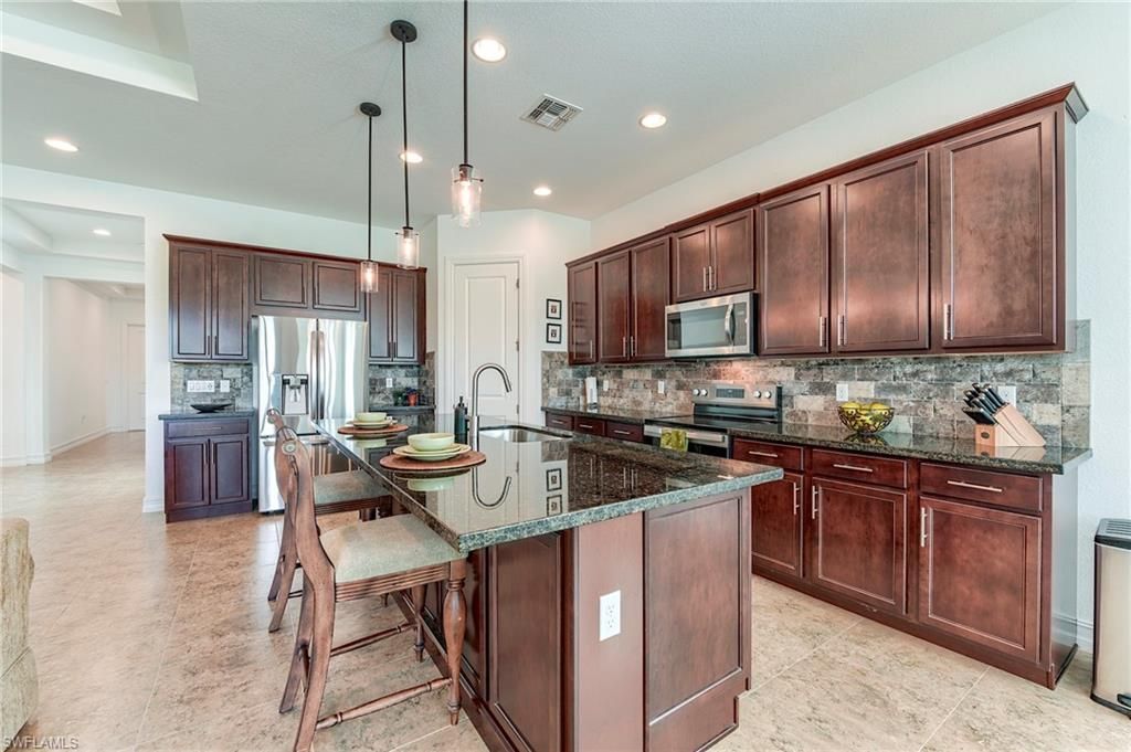 9209 Woodhurst Dr , Naples, FL 34120 Photo