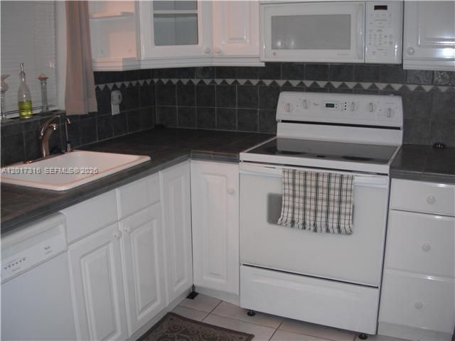 660 Tennis Club Dr , Unit 101, Fort Lauderdale, FL 33311 Photo