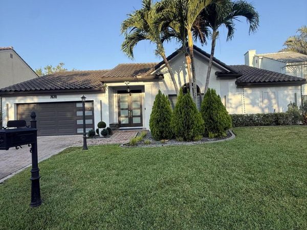 7670 NE Live Oak Drive, Coral Springs, FL 33065
