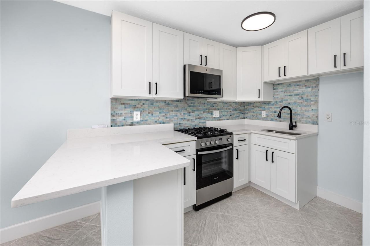 7740 Boca Ciega Drive, Unit 111, Saint Pete Beach, FL 33706 Photo