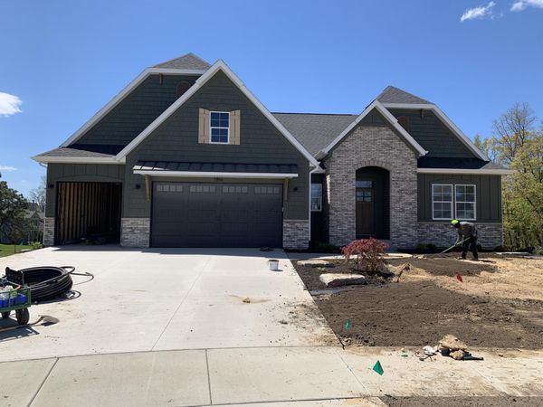 7814 Woodhurst Drive NE, Rockford, MI 49341